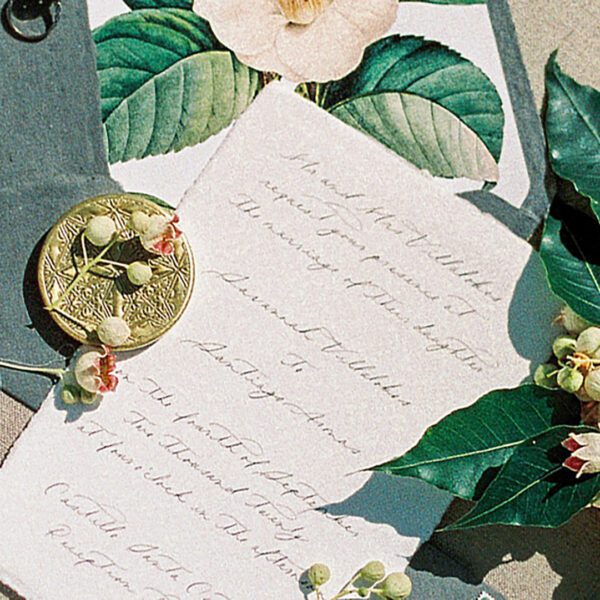 Zaproszenia ślubne w kolorze butelkowej zieleni